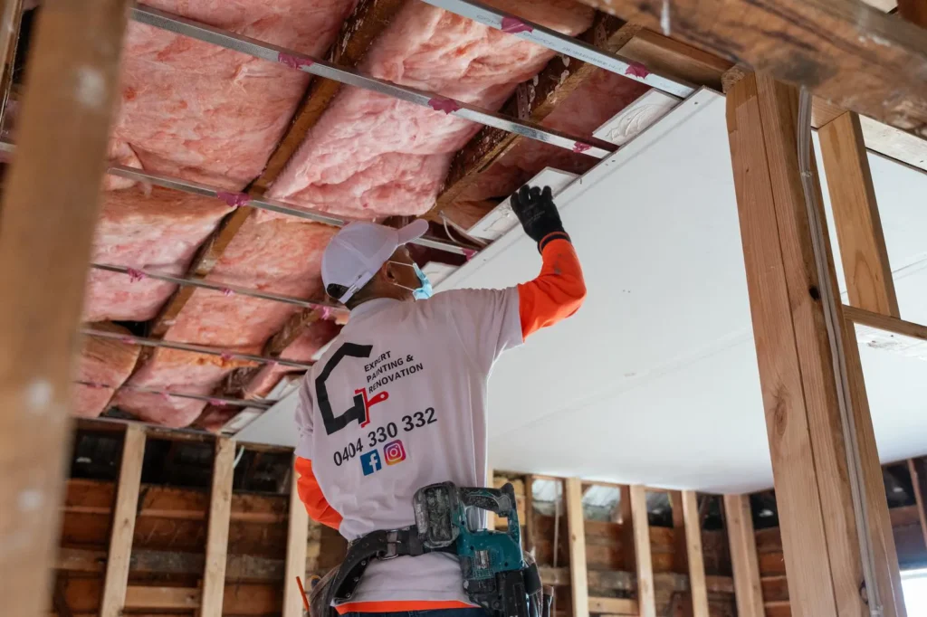 Commercial plastering repairs before painting